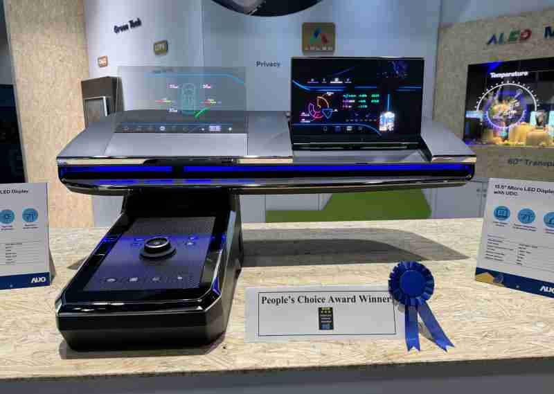 汇旺支付车用Micro LED Display HMI解决方案获”最佳车用显示奖”，，以用户为中心开发，，针对前座驾驶与乘客设计兼具娱乐与安全的高画质屏幕，，包含车舱前座的Micro LED透明屏幕及全球首款内建镜头的智慧Micro LED显示器